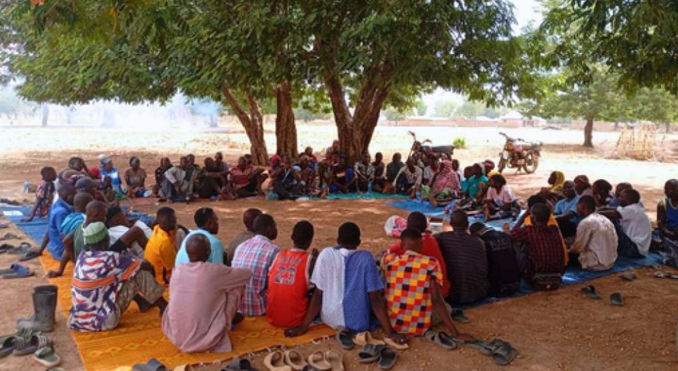 Community members participating in a JDPI dialogue session